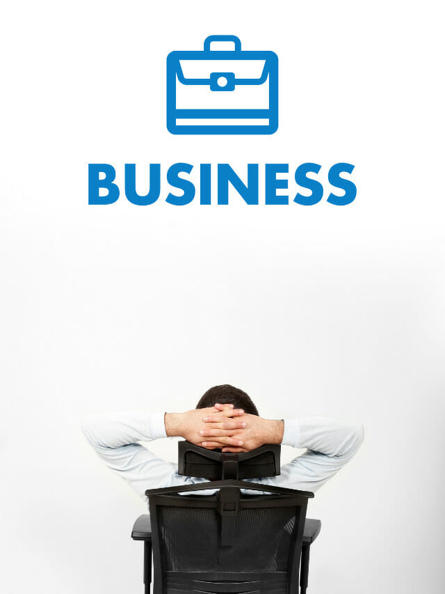 man sitting on chair and looking at business